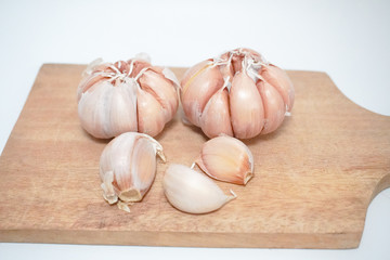 garlic on a wooden tray