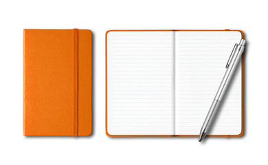 Orange closed and open notebooks with a pen isolated on white