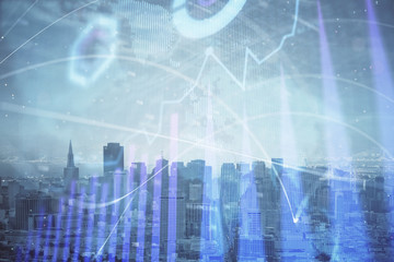 Forex graph on city view with skyscrapers background multi exposure. Financial analysis concept.