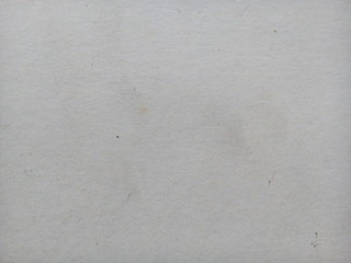 Stain on old white paper sheet texture background. Stained paper. Aged paper background. White aged.