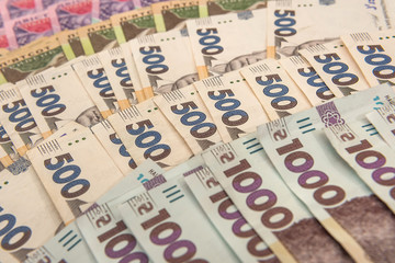 Obraz premium Background with Ukrainian money for design. UAH. New notes 500 and 1000.