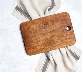 kitchen cloth napkin and kitchen board on white background with copy space
