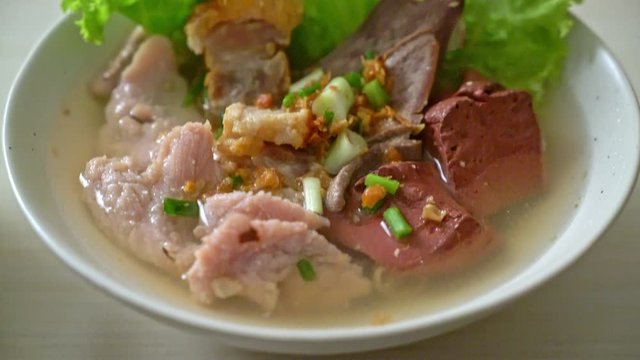 pork's entrails and blood jelly soup bowl with rice - Asian food style