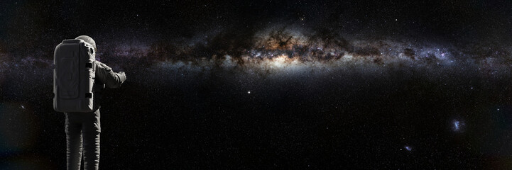 astronaut in outer space  with Milky Way galaxy