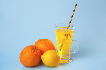 Fresh multifruit juice with ice in a glass.