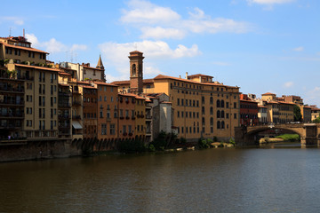 Fototapeta premium Firenze, Italy - April 21, 2017: Florence view and Carraia bridge, Florence, Firenze, Tuscany, Italy