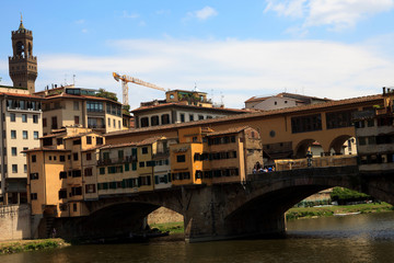 Obraz premium Firenze, Italy - April 21, 2017: Ponte Vecchio and Arno River in Florence, Firenze, Tuscany, Italy