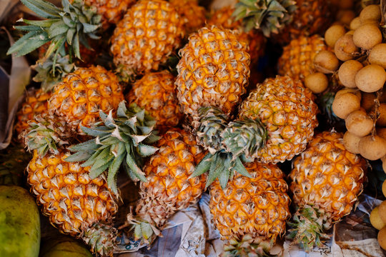 Fresh And Sweet Thai Fruits- Organic Pineapples, Holiday Season, Local Market Products. Street Thai Food, Lifestyle Background Photo, Thailand, Phuket