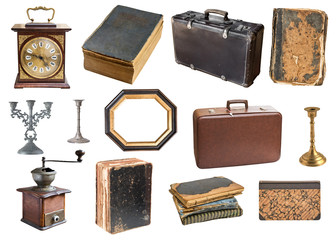 Set of a huge amount gorgeous old vintage items. Old books,desk clock, candlesticks. Isolated on white background.