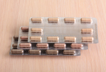 Medical pills in pack close-up on the table