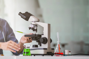 The medical team wore a coronavirus protective suit and rubber gloves to examine the coronavirus covid-19 and research for a vaccine to prevent coronavirus covid-19 to stop the epidemic.