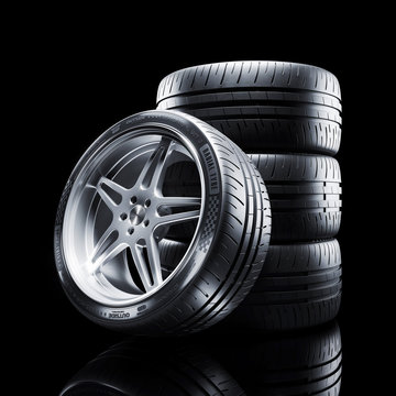 Car wheel isolated on black background 3d