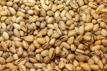 Pistachios. Salted pistachios. Pistachios in shell. pistachios close up. Pistachio background