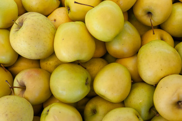 Fresh healthy apples in supermarket. Organic vegan food. Background.