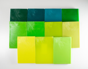 Plastic color swatches book. Sample colors catalogue for plastic products. Color Guide Book. Color palette. Color shade chart. Green colors