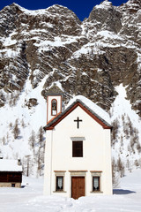 Devero Park ( Verbano-Cusio-Ossola ), Italy - January 15, 2017: The church in Crampiolo village at Alpe Devero Park, Ossola Valley, VCO, Piedmont, Italy