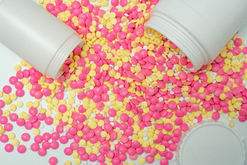 Many medicine pills on white background