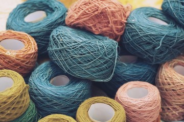 Close up of woolen balls of yarn balls Needlework Background