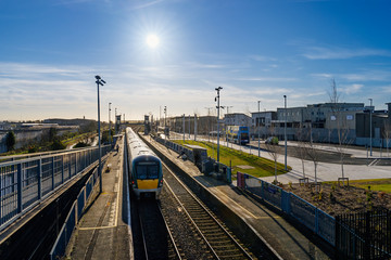 Naklejka na ściany i meble Dublin transportation hub for tram, train and bus in Broombridge station, illustrates lower number of commuters during epidemics Covid 19, coronavirus