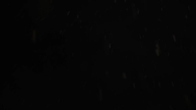 Lens distortion of light snow falling down. 
Falling snow isolated on black background in full HD to be used for composing, motion graphics,  Snowflakes falling, Isolated falling snow, Intense, Storm