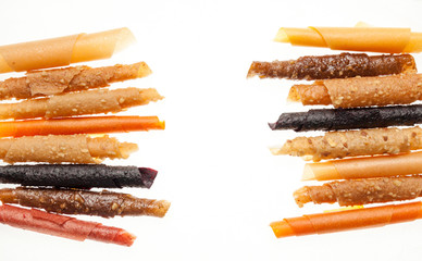 Fruit roll up bar, pastille isolated on white background. Healthy snack food, natural nutrition for kids.