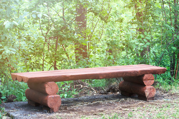 Empty wooden bench overlooking mountains and arid landscape of Malolotja Nature Reserve, Swaziland,...