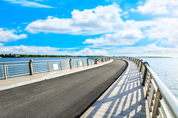 Asian bridge asphalt road and river nature landscape in summer
