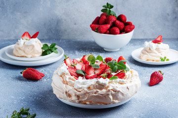 Cake Pavlova with meringue, strawberry and cream