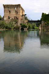 Borghetto (VR),  Italy - April 30, 2017: Mincio river in Borghetto village, Mincio, Verona, Veneto, Italy