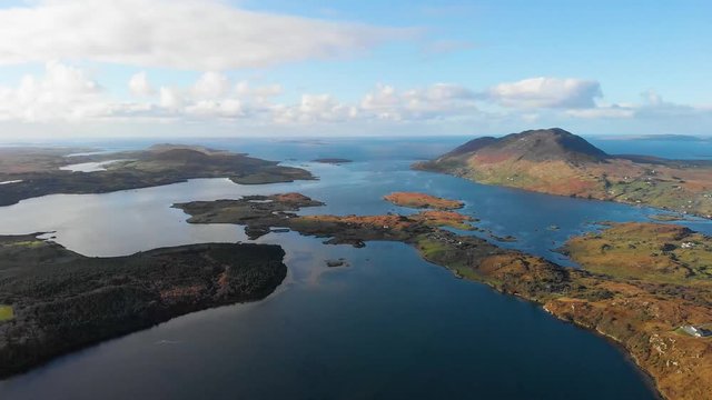 View on embayed shore and mountain from drone