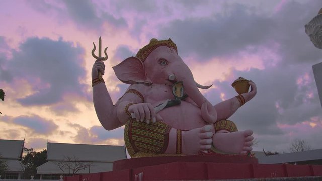 .Ganesha lord of success in sunrise..Ganesha Hindu God and the god of success in  Makha Bucha Buddhist memorial park at Nakornnayok province Thailand