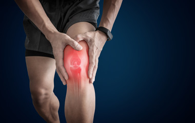 Joint pain, Arthritis and tendon problems. a man touching nee at pain point - 332362258