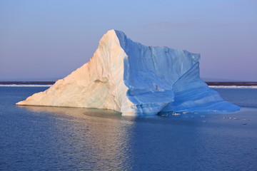 Fototapeta na wymiar Melting iceberg in Arctic ocean