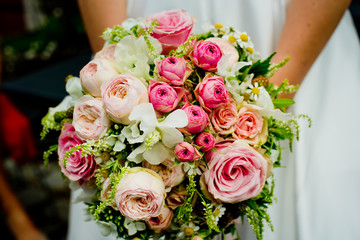 A beautiful bouquet of the bride in her hands.