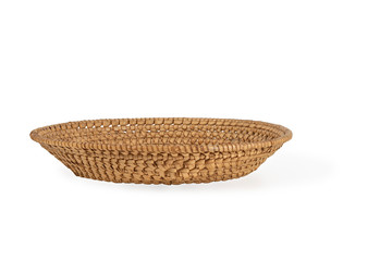 small wicker willow basket for fruit isolated on a white background
