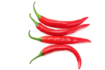 red hot chili peppers isolated on white background. top view