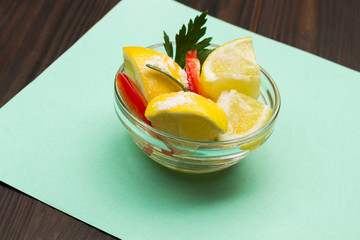 Fermented lemons with salt and chili pepper.