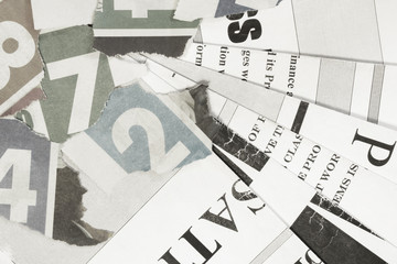 Abstract Background of Newspaper Pages with Headlines, Articles and Numbers Ripped to Pieces. News and Business Template