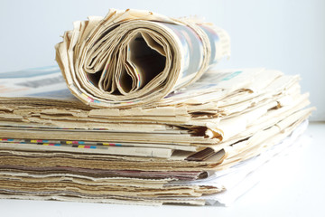 Newspapers Stacked in Pile. Lots of Journals with News. Heap of Magazines with Headlines and Articles. Paper Pages with Business Information         