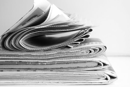 Newspapers Stacked in Pile. Lots of Journals with News. Heap of Magazines with Headlines and Articles. Paper Pages with Business Information         