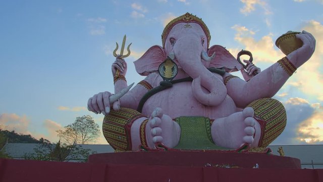 .Ganesha lord of success in sunrise..Ganesha Hindu God and the god of success in  Makha Bucha Buddhist memorial park at Nakornnayok province Thailand