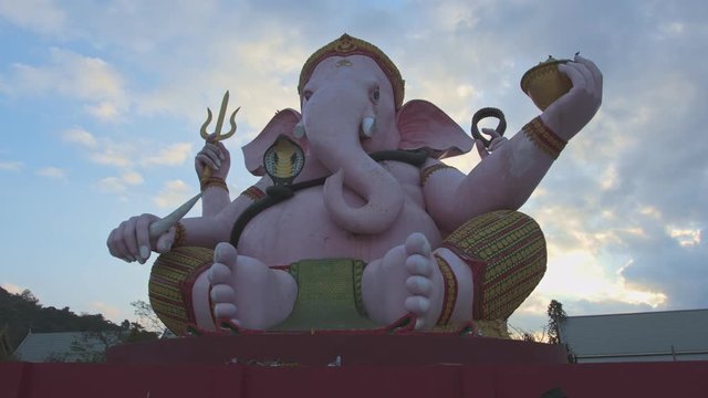 .Ganesha lord of success in sunrise..Ganesha Hindu God and the god of success in  Makha Bucha Buddhist memorial park at Nakornnayok province Thailand