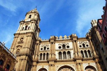 The north tower and west facade of the renaissance Cathedral (Catedral Manquita), Malaga, Spain.