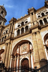 Fototapeta na wymiar View of the Cathedrals Chain Gate door (Puerta de las Cadenas), Malaga, Spain.