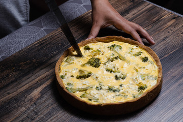 Appetizing kish with salmon, broccoli and feta cheese