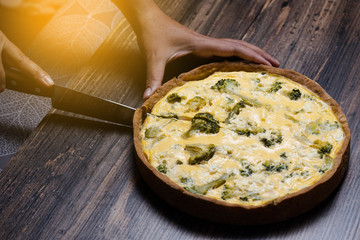 Appetizing kish with salmon, broccoli and feta cheese