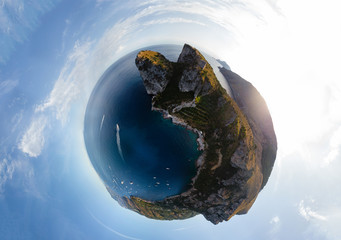 Little planet. Aerial landscape of Ieranto bay in demi-island Sorrento, Mountains, rocky shores and...