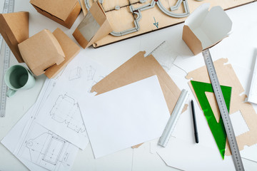 Image of top view of workplace packaging designer