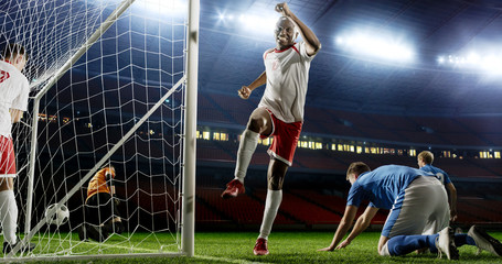 Tense game moment in front of the goal on the empty professional soccer stadium. No spectators on tribunes. Stadium is made in 3d.