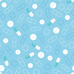 Fototapeta na wymiar Seamless pattern of pills. Blue medical background.